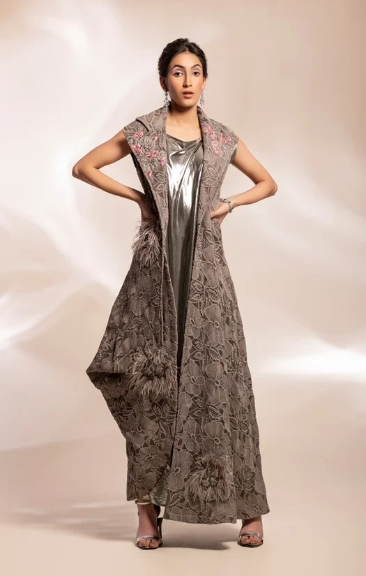 Grey drape jacket worn over inner drape dress